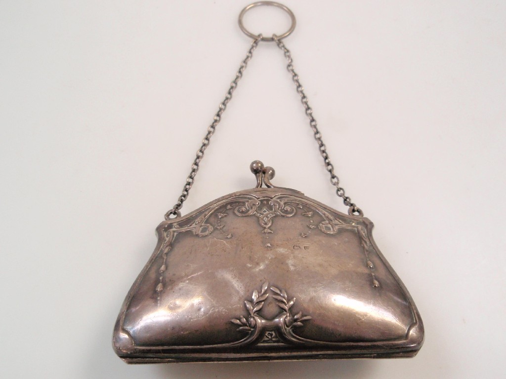 Appraisal: An early thC silver evening purse of Bombe form carved