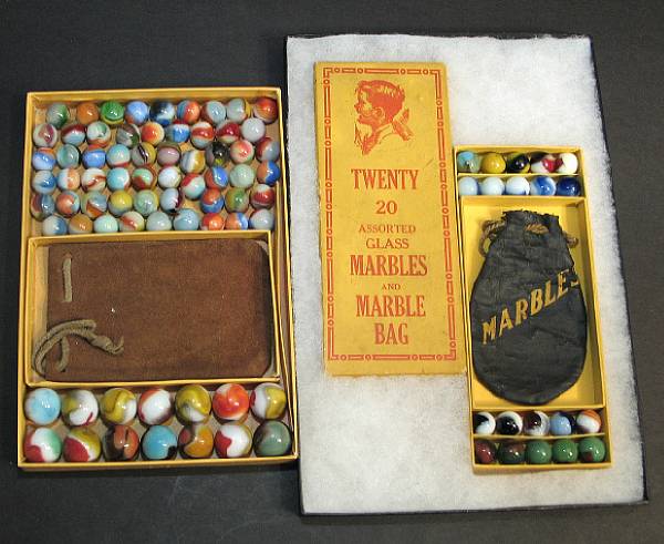 Appraisal: Several boxed marbles amp marble bags Grouping of two boxed