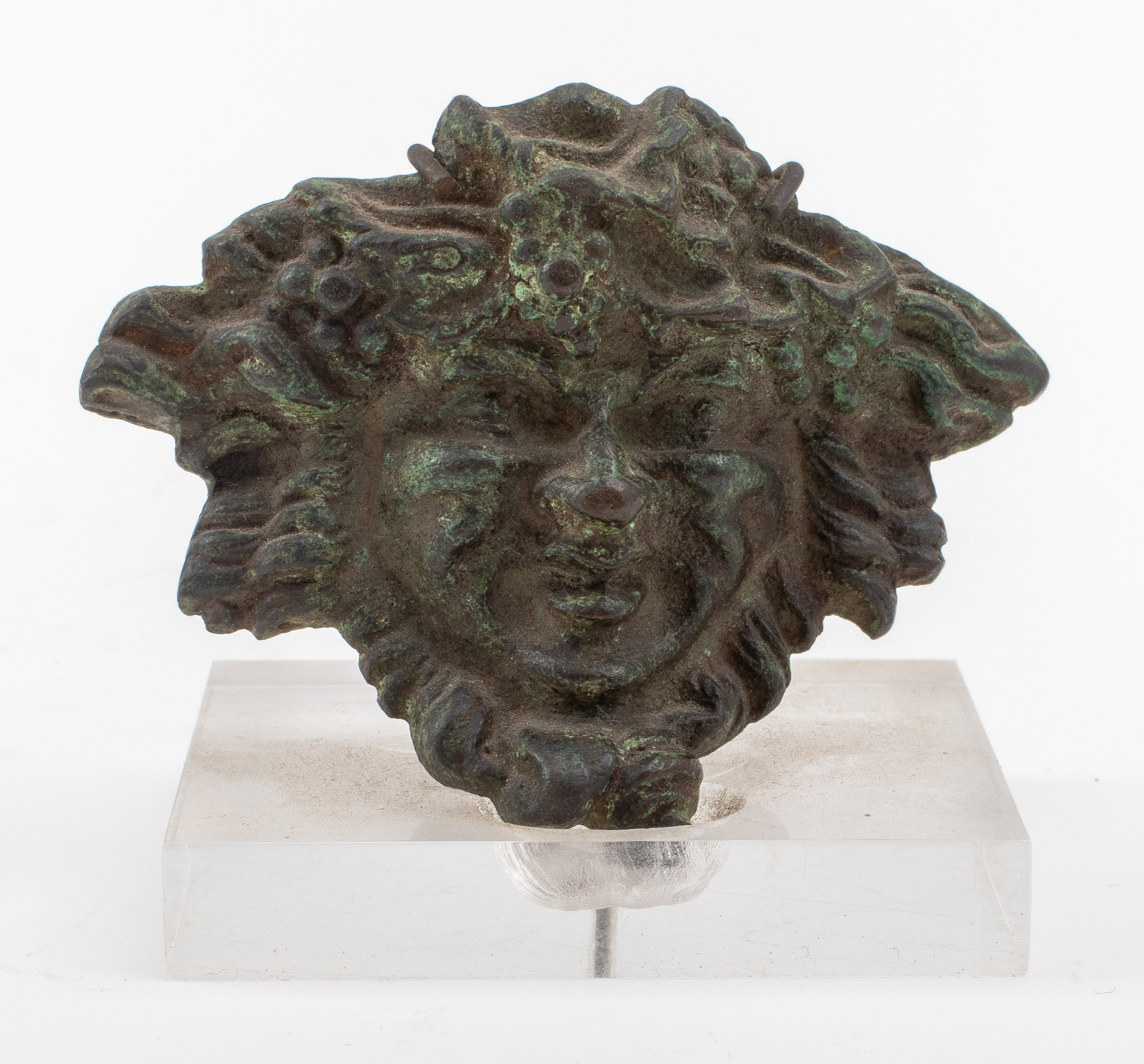 Appraisal: PATINATED BRONZE MASQUE OF BACCHUS Patinated bronze masque of Bacchus