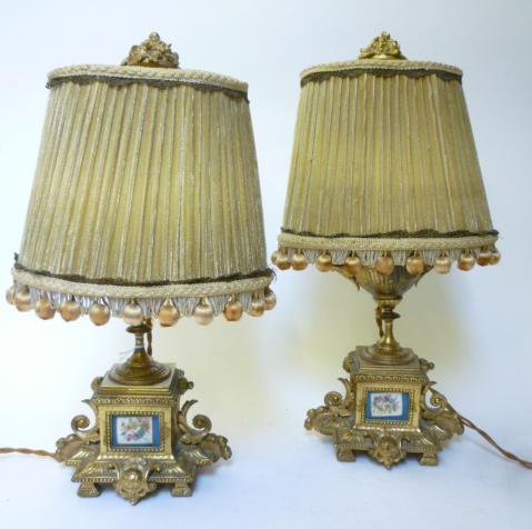 Appraisal: A PAIR OF FRENCH GILT METAL MANTEL GARNITURE LAMPS late