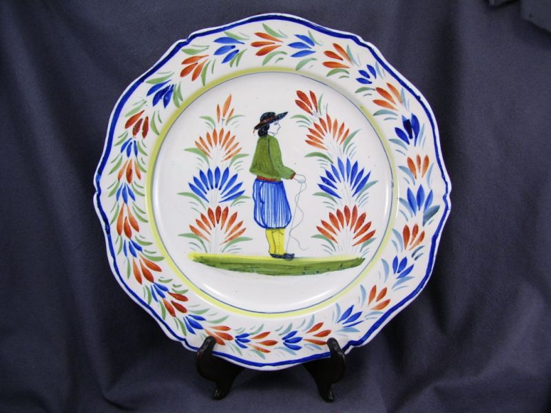 Appraisal: Quimper Large Round Plate Large scalloped edge plate with a