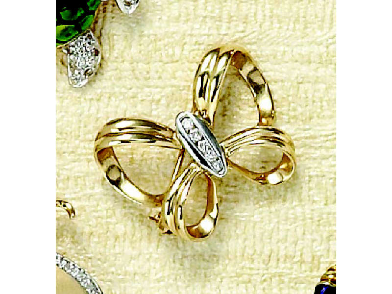 Appraisal: DIAMOND BUTTERFLY PIN k yellow gold brooch with ribbon butterfly