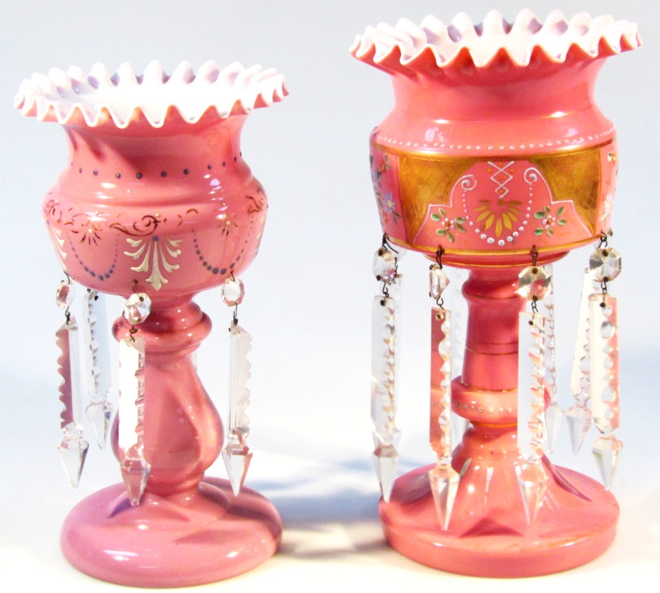 Appraisal: A thC pink glass lustre the castellated top of dumbbell