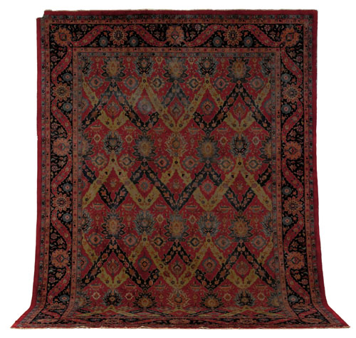 Appraisal: Indo Kirman carpet ca with a red field and overall