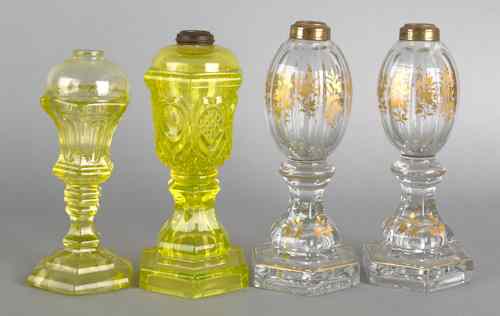 Appraisal: Pair of gilt decorated colorless glass whale oil lamps th