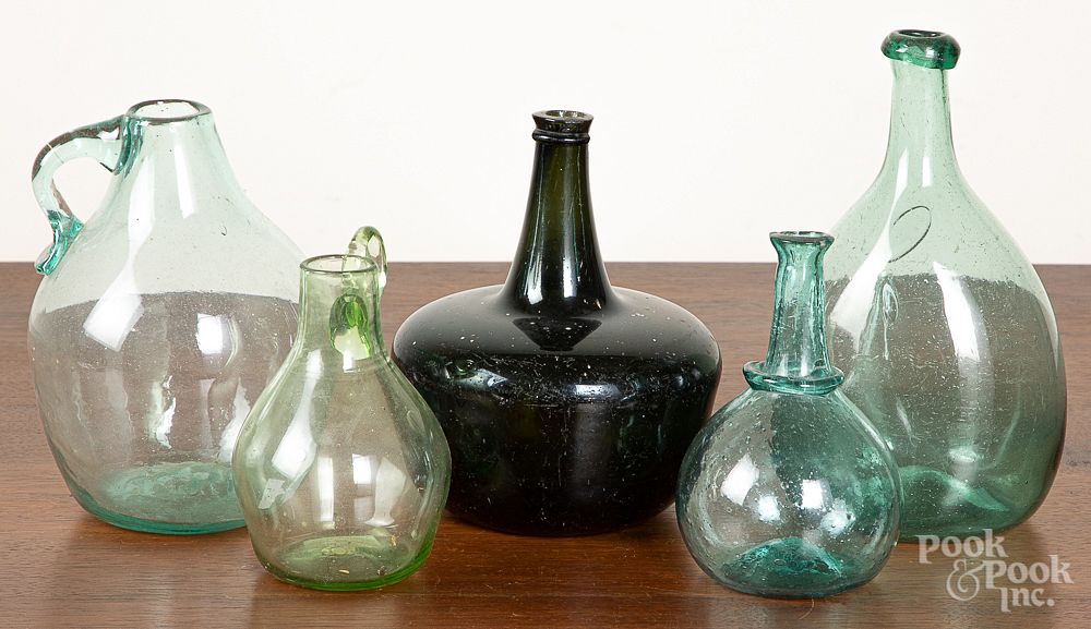 Appraisal: Five early blown olive and aqua glass bottles Five early