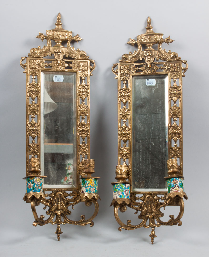 Appraisal: Pair of Classical style two-light sconces each mirrored-back sconce with