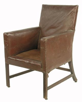 Appraisal: A George III library armchair with later brass studded leatherette