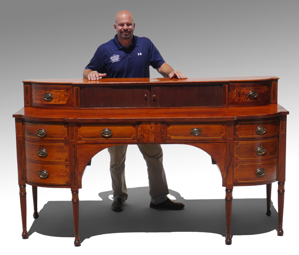 Appraisal: TH CENTURY MAHOGANY TAMBOUR DOOR SIDEBOARD Top storage with tambour