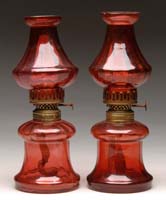 Appraisal: PAIR OF CRANBERRY MINI LAMPS S - Cranberry glass optic