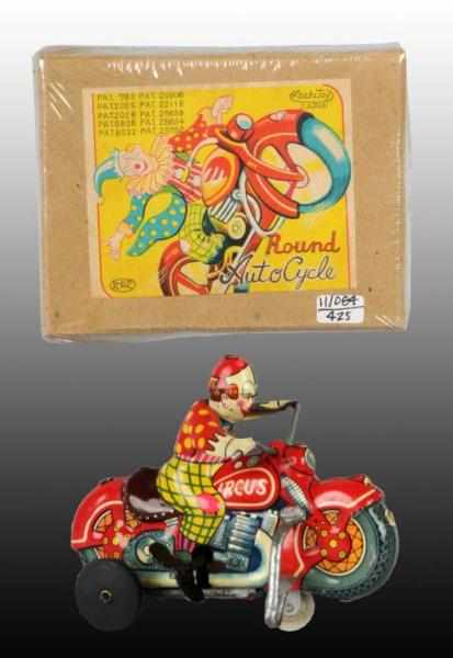 Appraisal: Tin Circus Motorcycle Wind-Up Toy Description Japanese Working Marked Circus