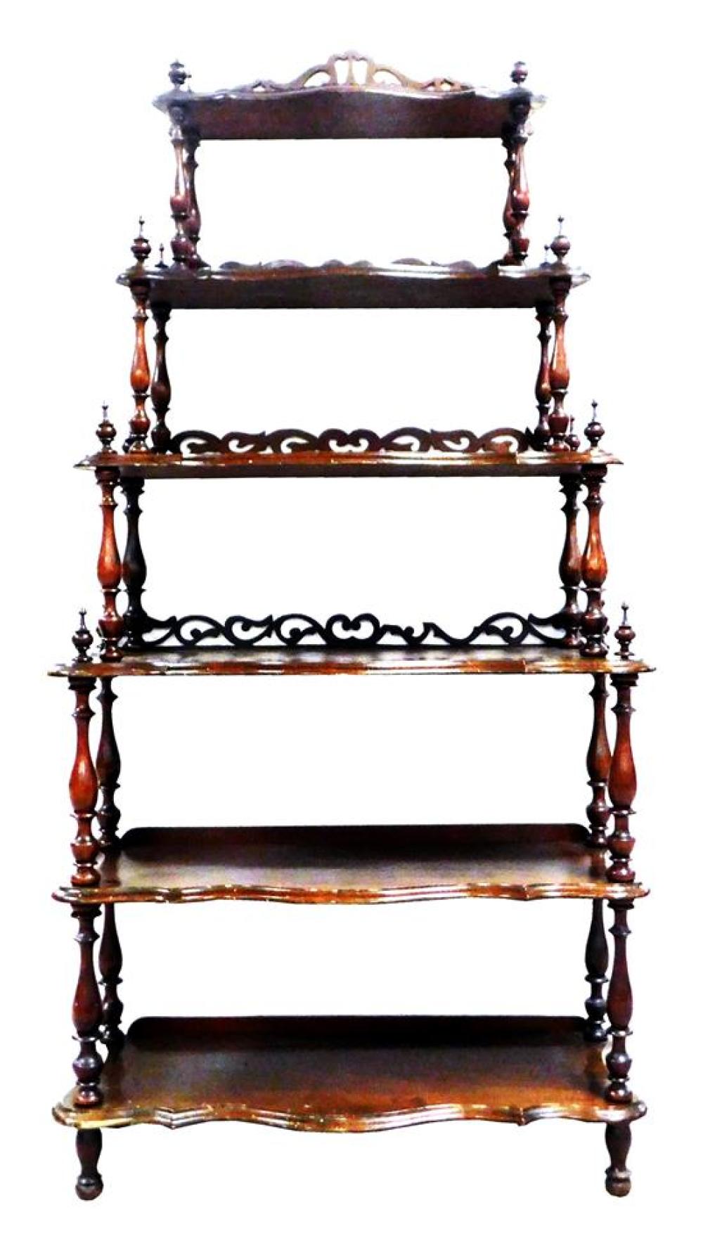 Appraisal: Victorian etagere late th C mahogany six graduated shelves with