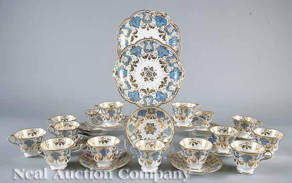 Appraisal: An English Porcelain Partial Tea Set c blue and richly