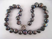 Appraisal: A grey baroque cultured pearl necklace pearls approx x mm