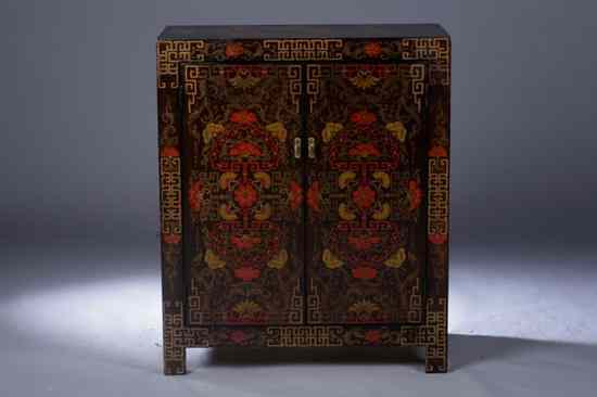 Appraisal: CHINESE BLACK LACQUERED CABINET The rectangular top above two doors