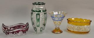 Appraisal: Four Bohemian cut to clear glass vases including Amethyst rose