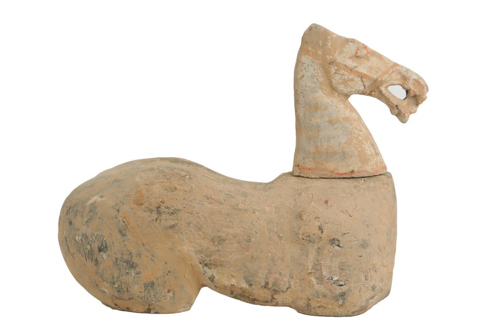 Appraisal: TANG STYLE TERRACOTTA SEATED HORSE inches wide inches high Condition