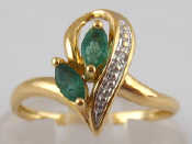 Appraisal: A French hallmarked carat gold emerald and diamond ring emeralds