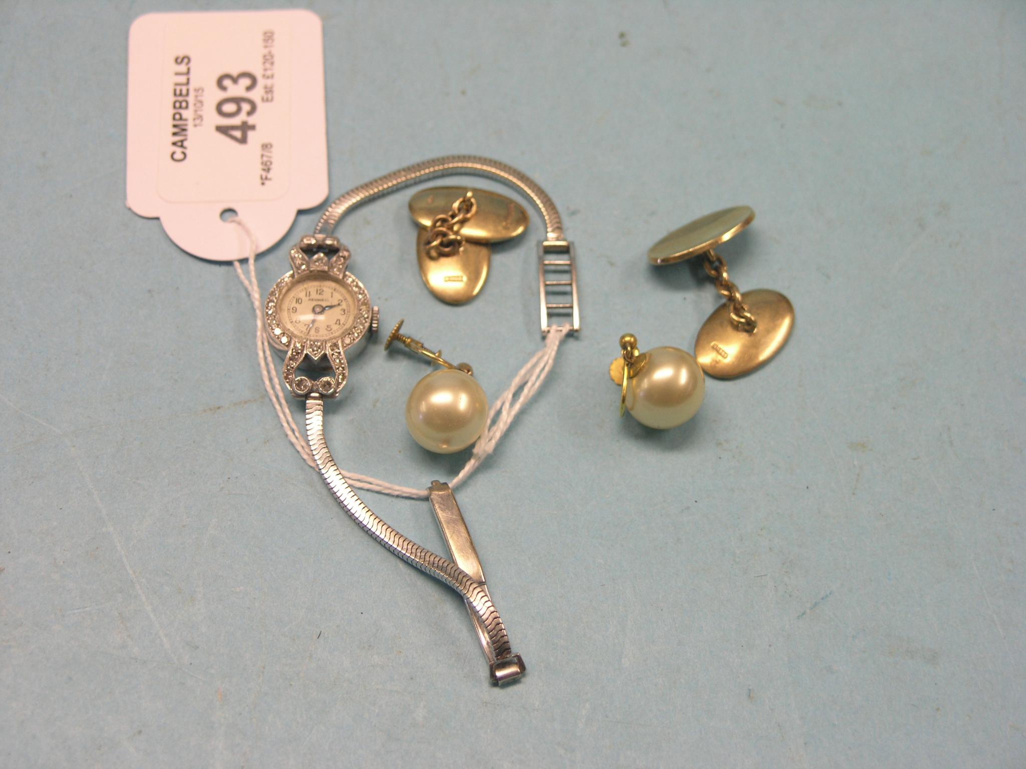 Appraisal: A pair of ct gold cuff-links grams total ct white