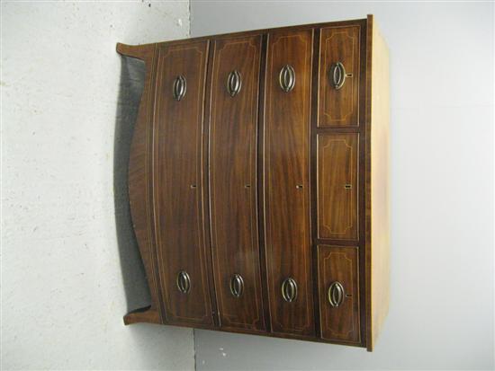 Appraisal: Mahogany bow fronted chest of three short over three long