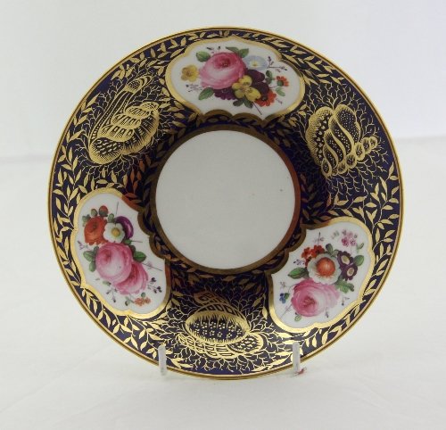 Appraisal: A Davenport saucer dish finely painted reserves of flowers within