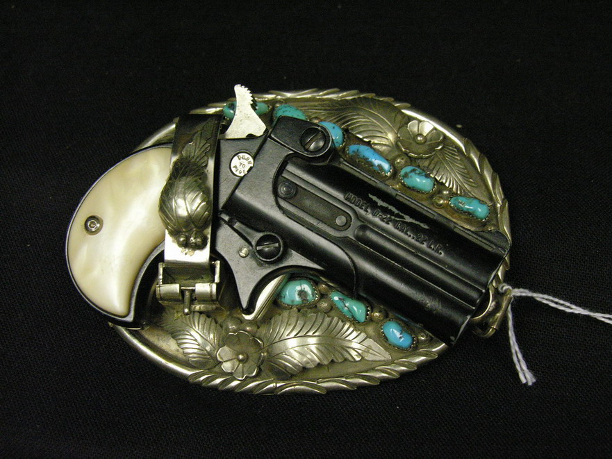 Appraisal: SILVER AND TURQUOISE BUCKLE WITH PISTOL Estate piece