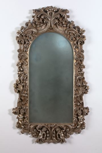 Appraisal: Ornate Antique Silver-Finished Rococo Revival Looking Glass the frame with