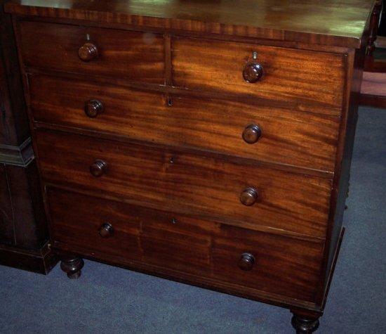 Appraisal: An early Victorian mahogany chest of three long and two