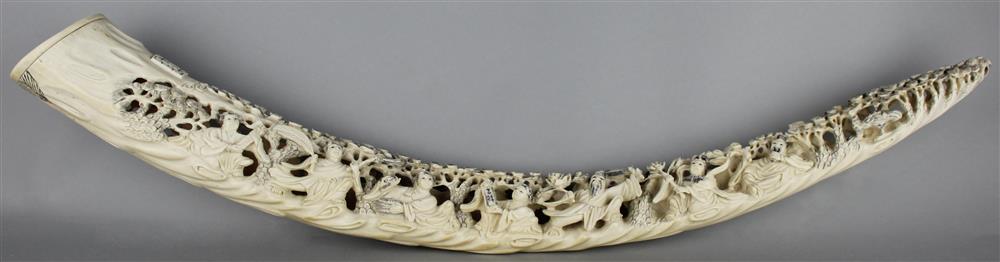 Appraisal: CARVED TUSK carved figures with seven on one side and