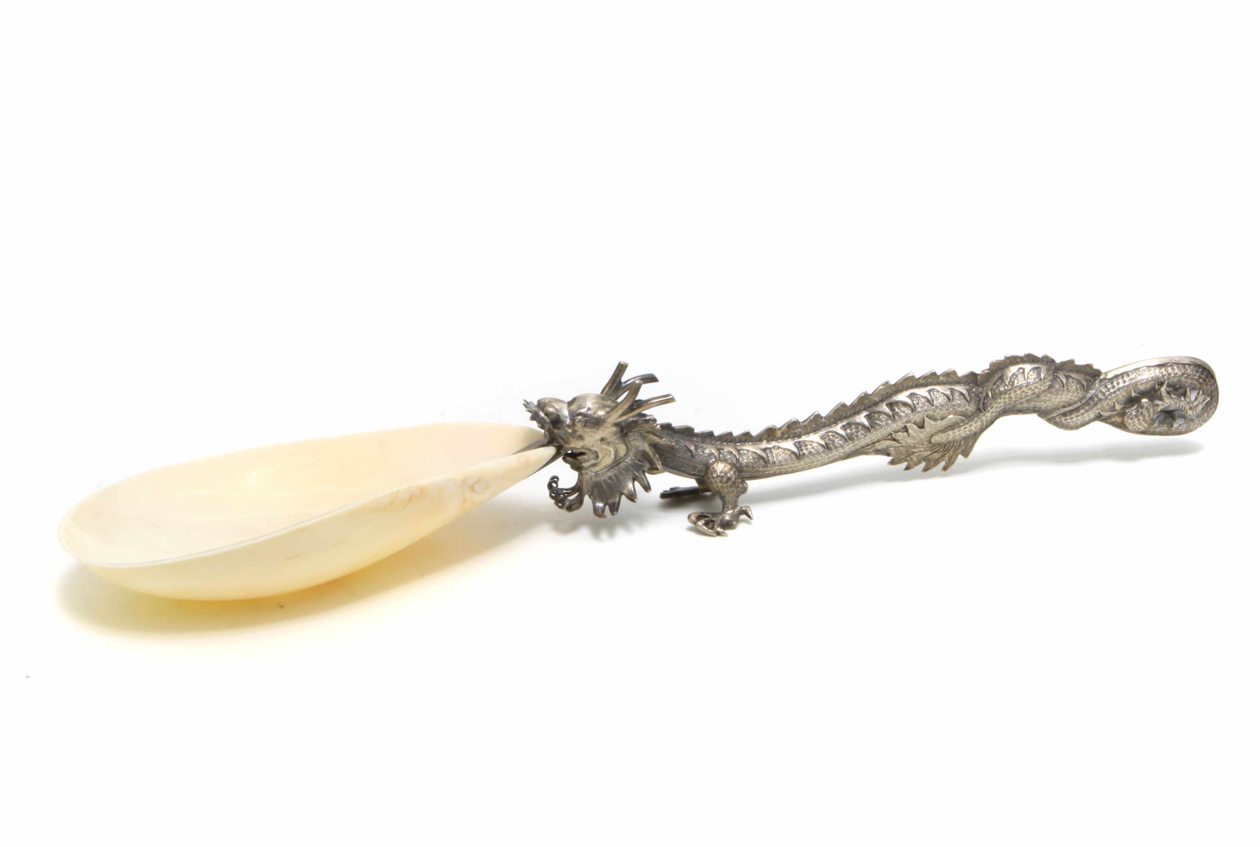 Appraisal: A Chinese Export silver and shell dragon-form serving spoon Late