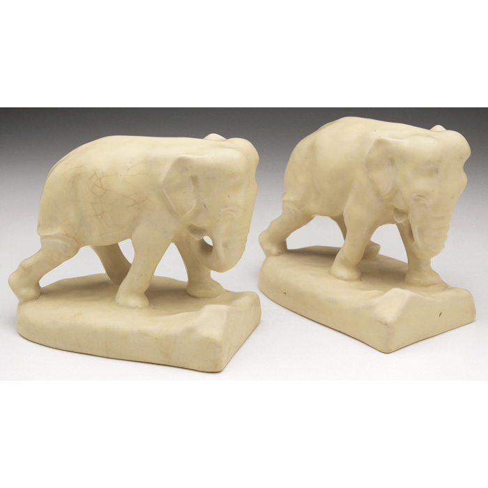 Appraisal: Rookwood bookends pair elephant covered in an ivory matt glaze