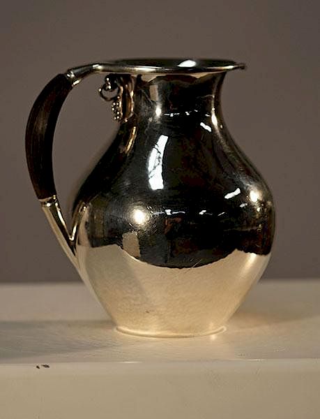 Appraisal: Georg Jensen Sterling Pitcher Georg Jensen sterling water pitcher with