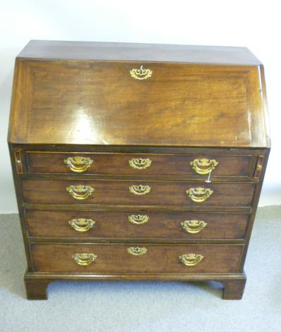 Appraisal: A GEORGE III MAHOGANY BUREAU th century the fall front