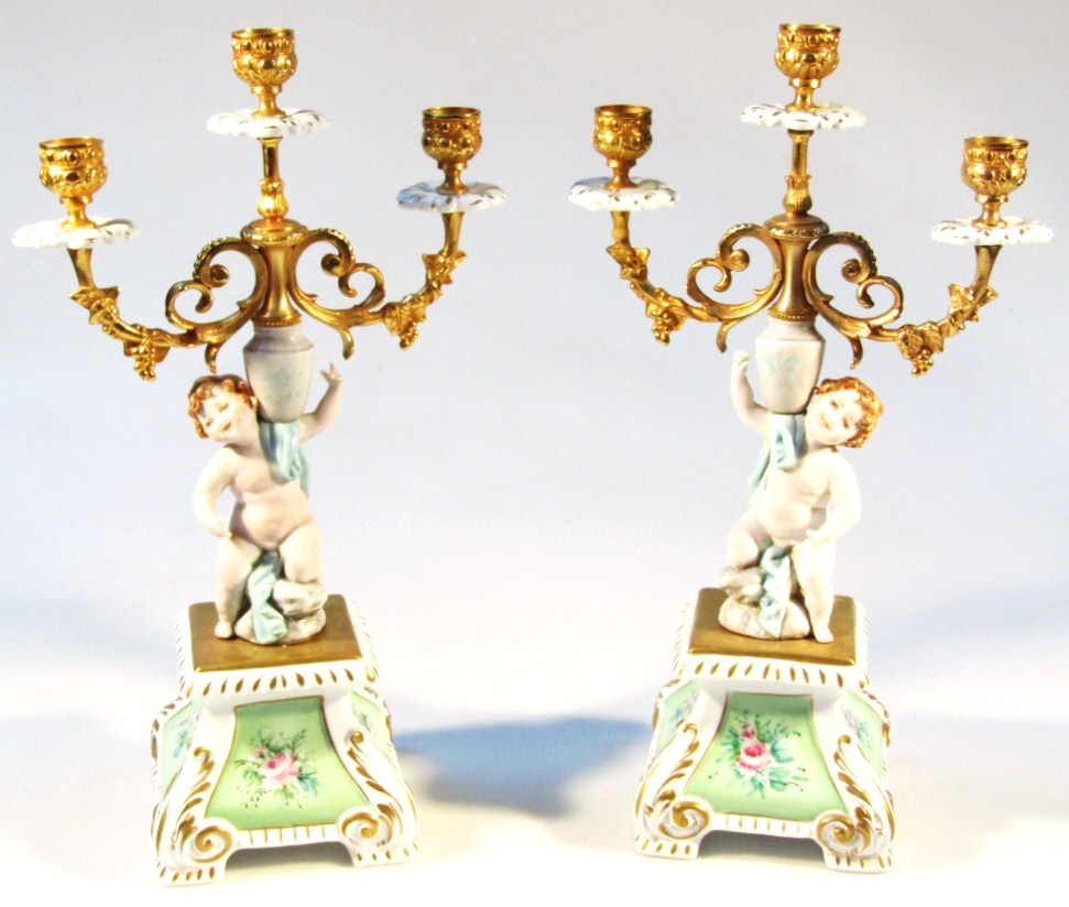 Appraisal: A pair of Tiche porcelain garniture vases each with triple