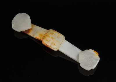 Appraisal: A Carved White Jade Miniature Ruyi Scepter Carved with archaic