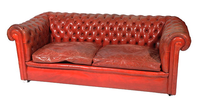 Appraisal: A RED LEATHER BUTTON UPHOLSTERED CHESTERFIELD SOFA cm wide