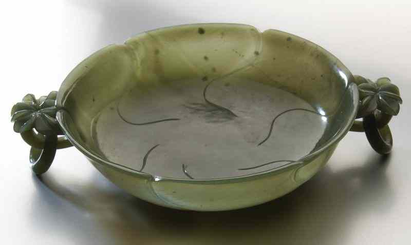 Appraisal: Chinese Qing carved spinach jade Mughal style dishwith two free