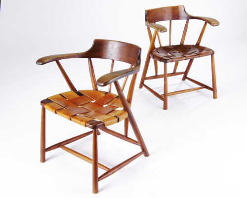 Appraisal: WHARTON ESHERICK Pair of walnut armchairs with woven brown leather