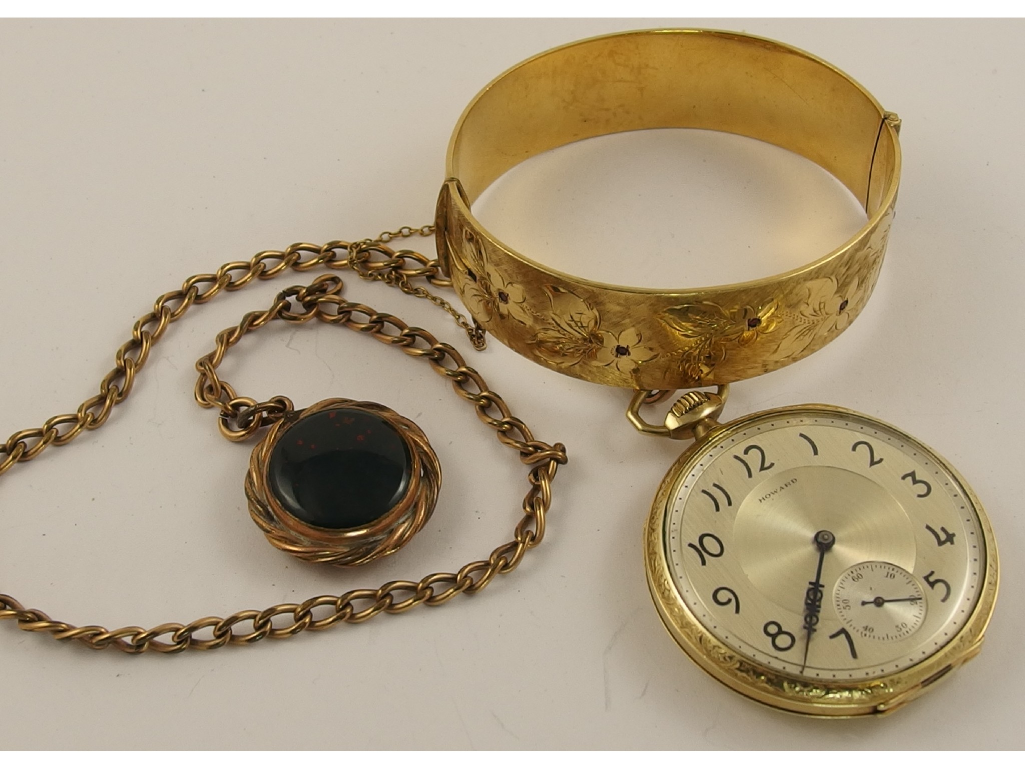 Appraisal: A gold plated Howard pocket watch with gold plated chain