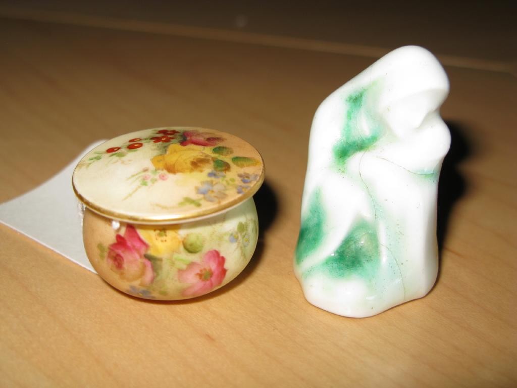 Appraisal: A rare Royal Doulton Jade figure group mother and child