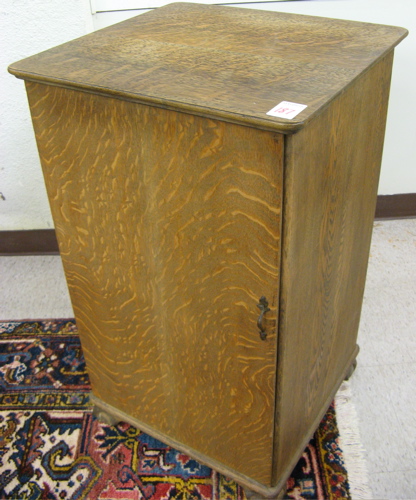 Appraisal: AN OAK CYLINDER RECORD STORAGE CABINET American c The plain