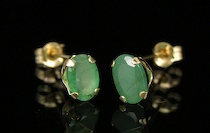 Appraisal: A Pair of Emerald Ear Studs k yellow gold ear