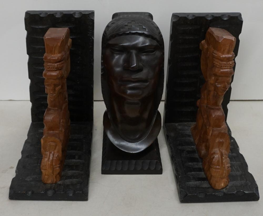 Appraisal: South American Style Carved Wood Bust and Pair of Bookends