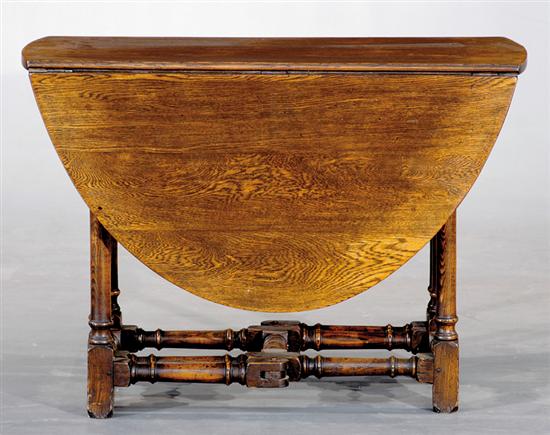 Appraisal: English oak gateleg table late th century oval top with