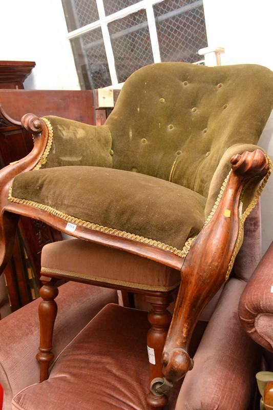 Appraisal: A VICTORIAN LADIES ARMCHAIR IN GREEN VELVET UPHOLSTERY A VICTORIAN