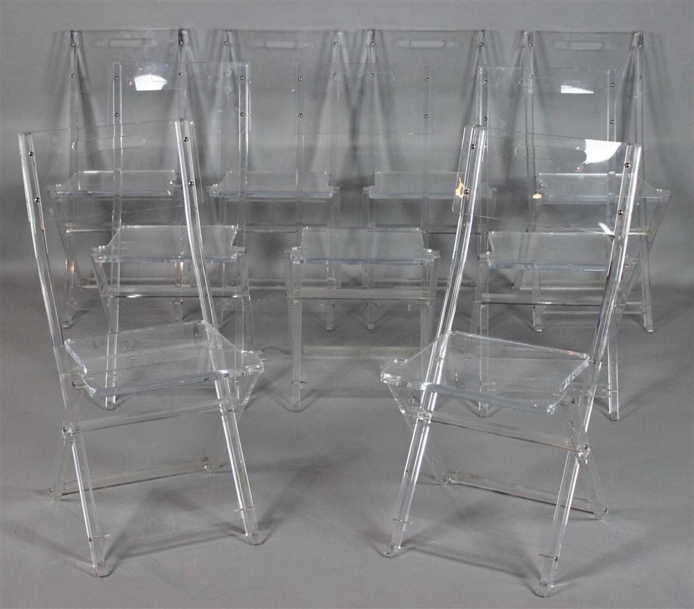 Appraisal: SET OF NINE AKKO LUCITE FOLDING CHAIRS sturdy construction with