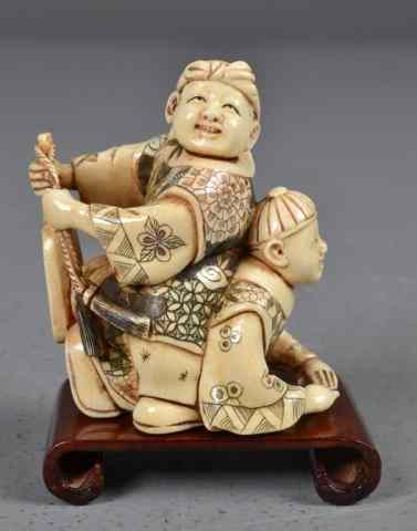 Appraisal: Japanese Carved Ivory Polychrome Figural GroupFinely carved and painted to