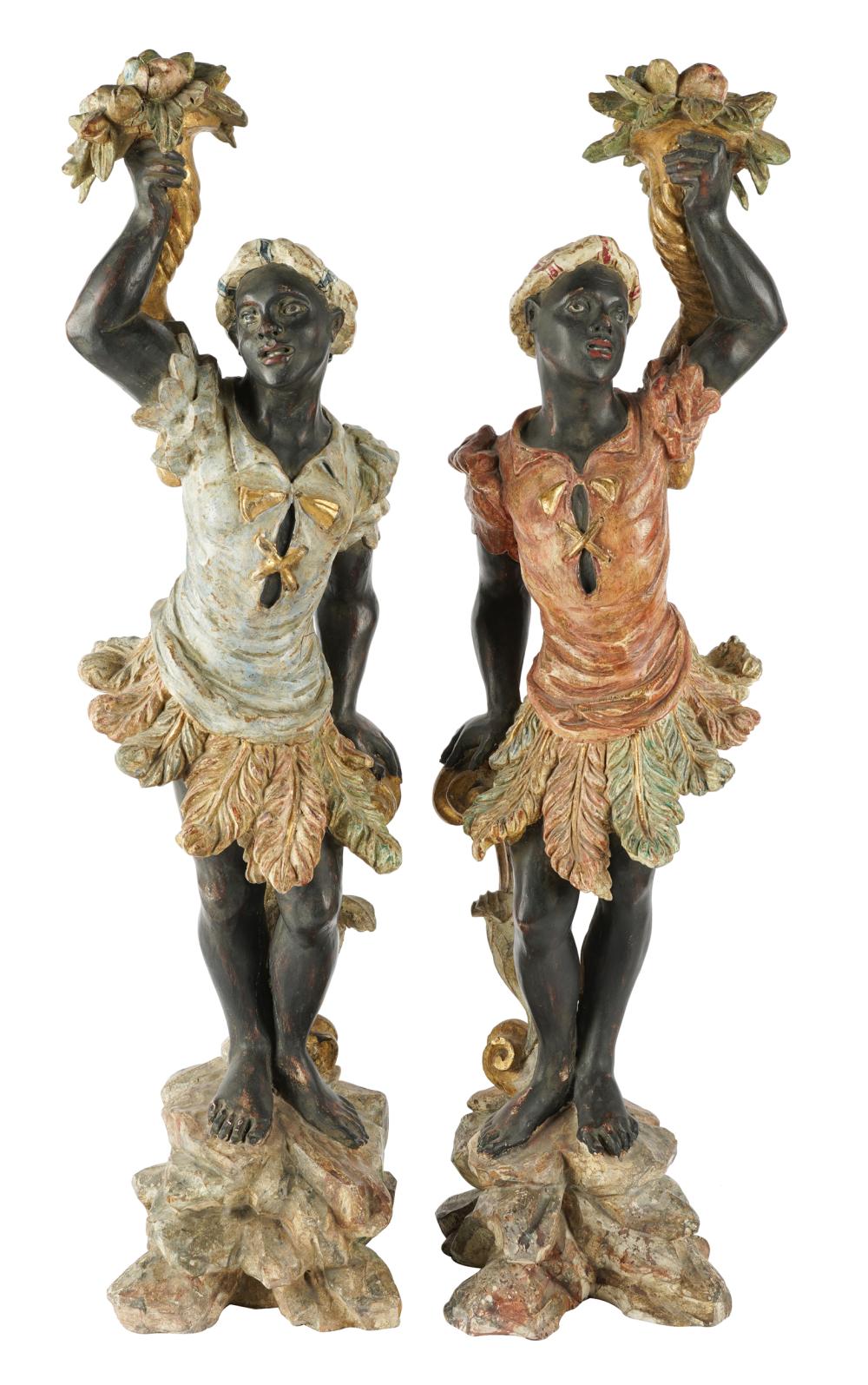 Appraisal: PAIR OF BLACKAMOOR FIGURES th century carved painted and gilt