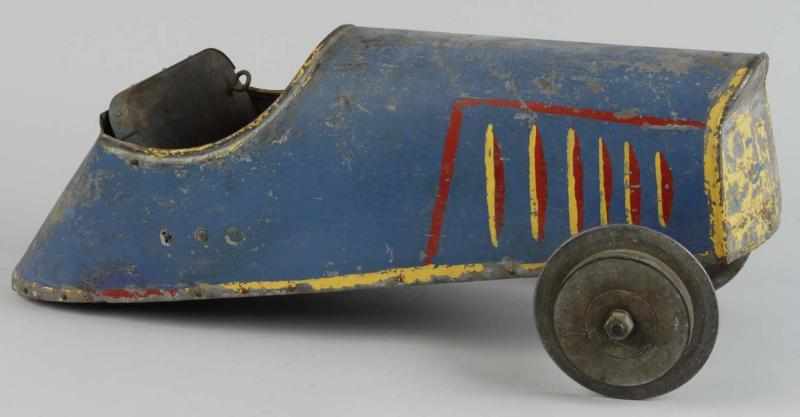 Appraisal: Pressed Steel Monkey Racing Car Description Vintage car used on