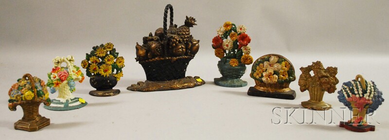 Appraisal: Eight Cast Iron Basket of Flowers and Fruit Doorstops most